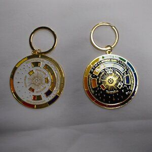Two new The Grey Muse interactive spinning multi-color wheel key chain